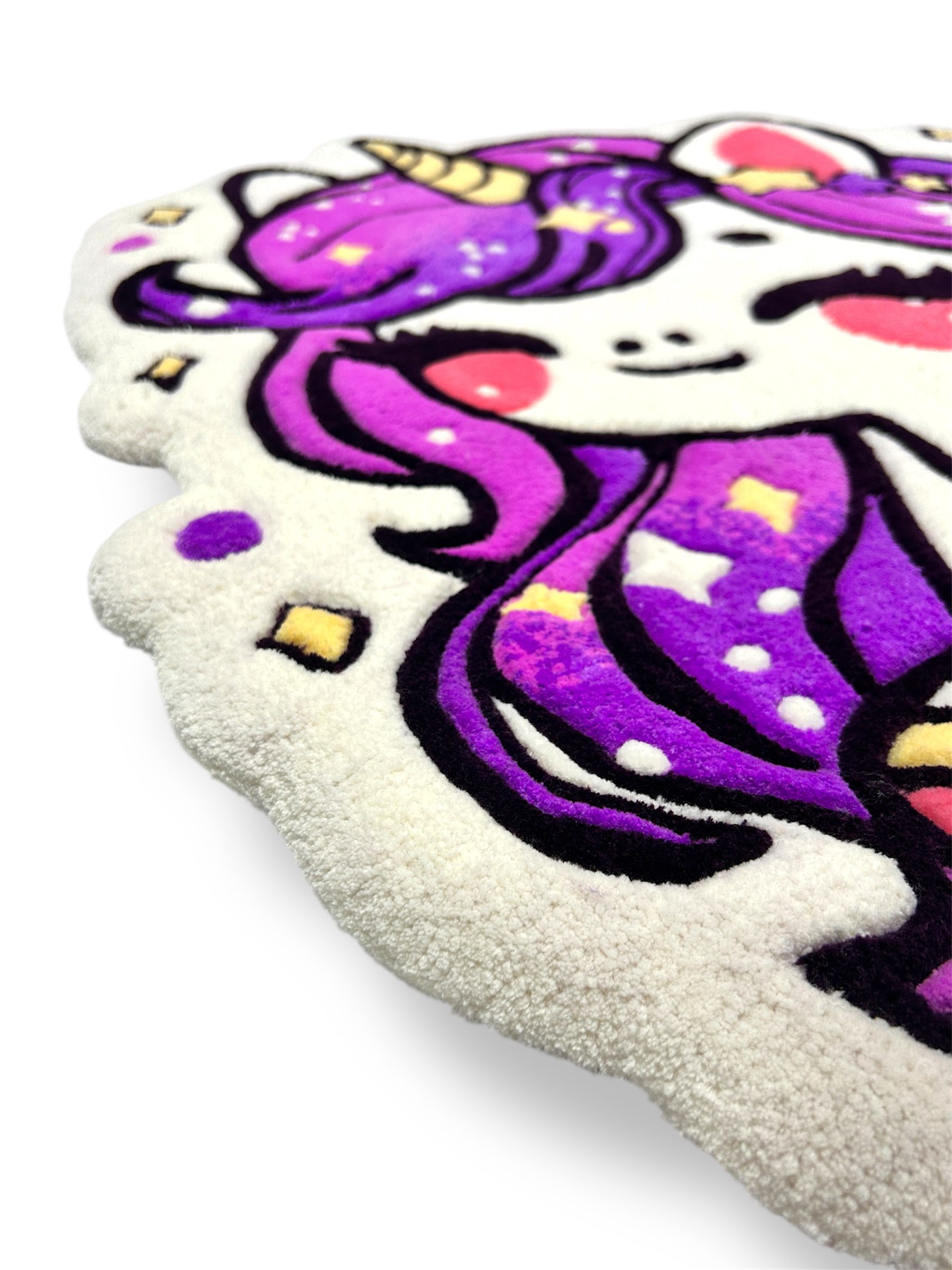Violet handmade tufted rug with unicorn design – side angle