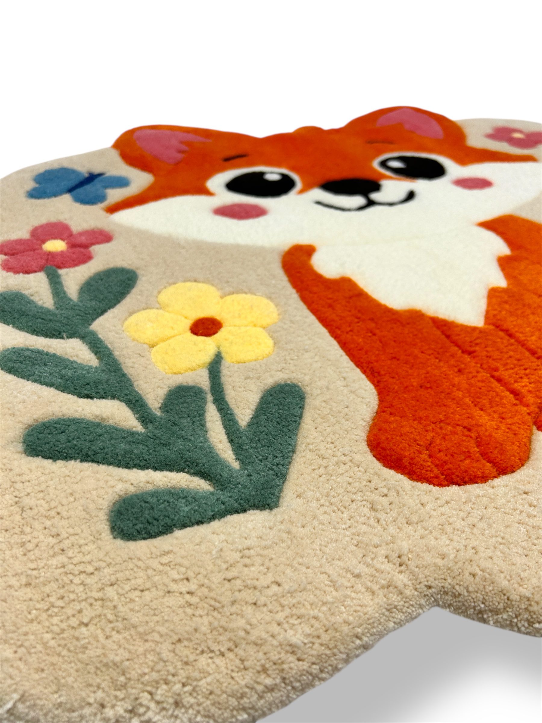 Close-up of handmade tufted rug surface showing acrylic yarn texture and detailed tufting work.