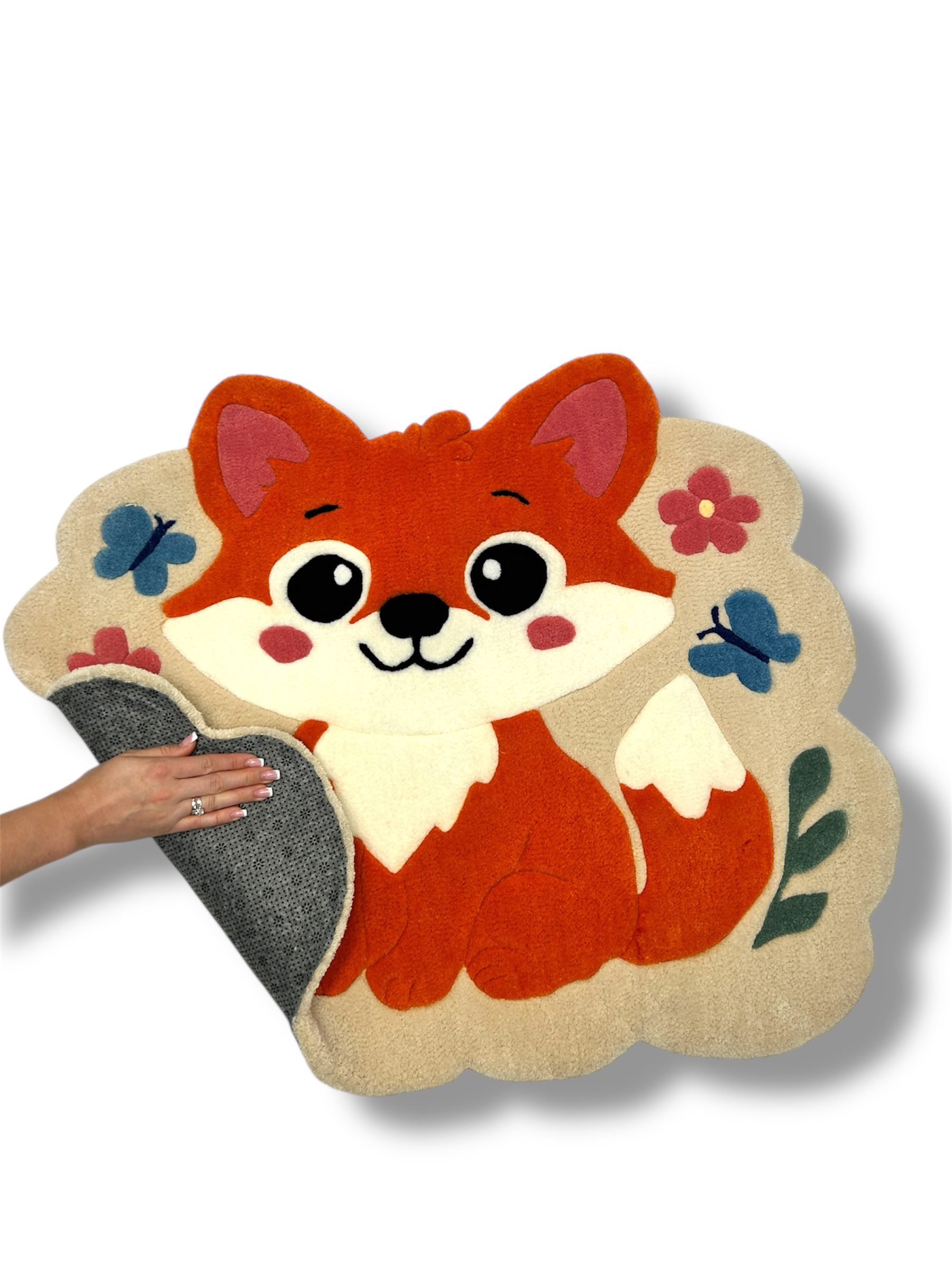 Back view of handmade kids rug showing anti-slip backing for safe use on any floor surface.