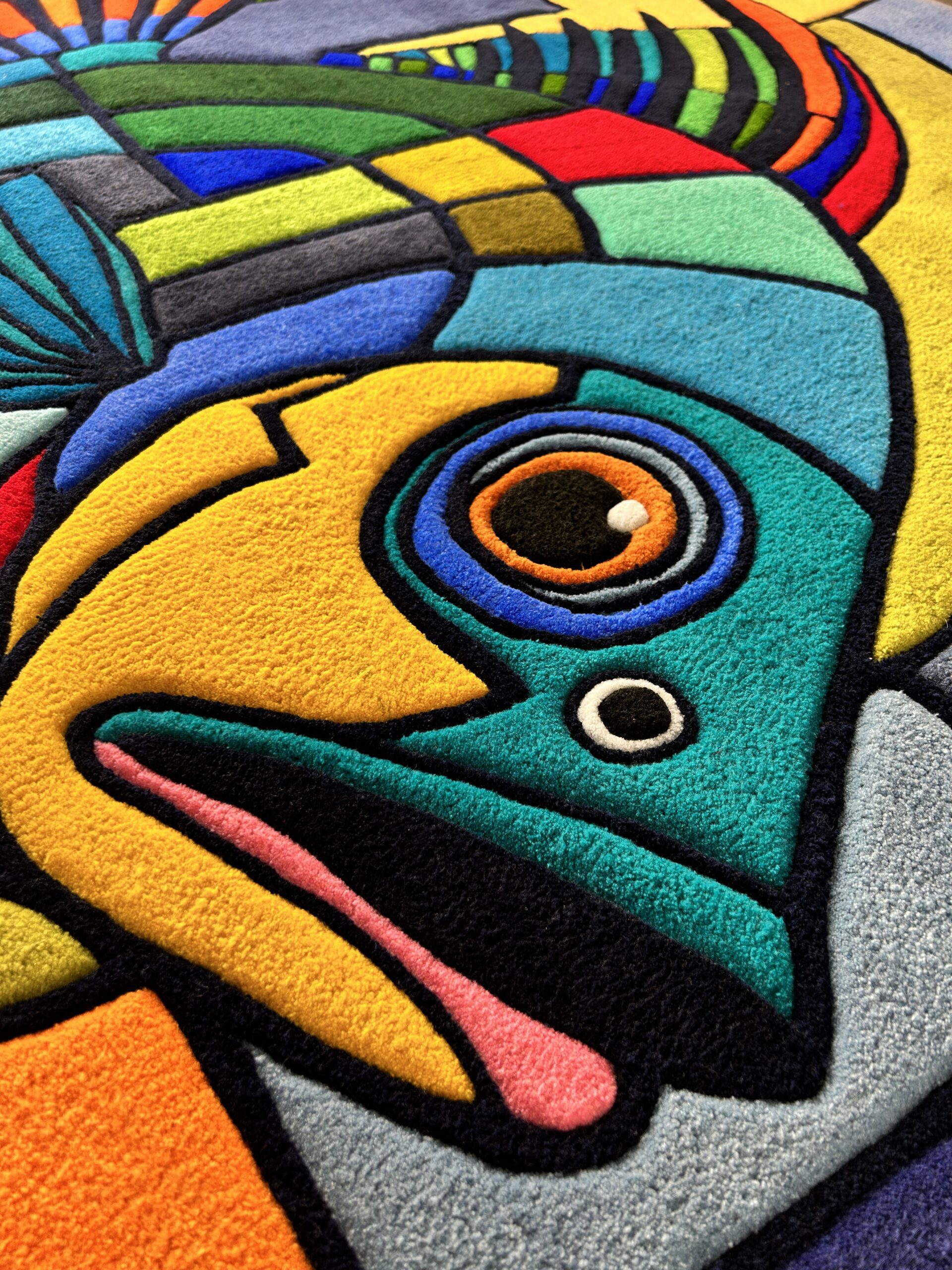 Handmade tufted fish head close up view